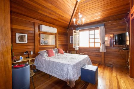 Casa de condomínio à venda com 335m², 4 quartos e 4 vagasSuite 1