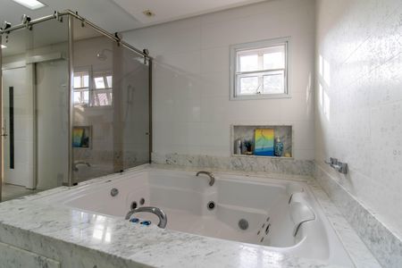 Casa de condomínio à venda com 205m², 3 quartos e 5 vagas Casa de condomínio à venda com 205m², 3 quartos e 5 vagasBanheiro da Suíte 1