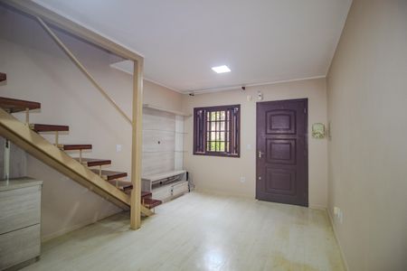 Sala de casa de condomínio para alugar com 2 quartos, 56m² em Vila Nova, Porto Alegre