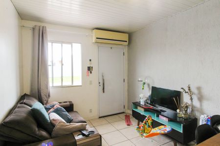Sala de casa de condomínio à venda com 2 quartos, 83m² em Mato Grande, Canoas