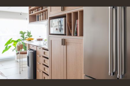 Apartamento à venda com 160m², 2 quartos e 3 vagasCozinha moderna com móveis de madeira e equipamentos de alta qualidade.