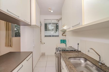 Apartamento à venda com 48m², 2 quartos e 1 vaga Apartamento à venda com 48m², 2 quartos e 1 vagaCozinha e Área de Serviço