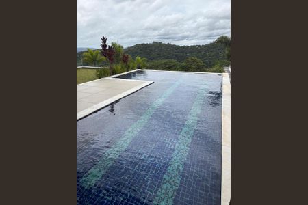 Casa de condomínio à venda com 615m², 5 quartos e 6 vagasÁrea externa