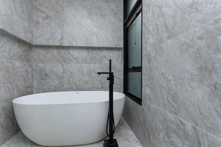 Casa à venda com 240m², 3 quartos e 2 vagasBanheiro do quarto 3 Suíte