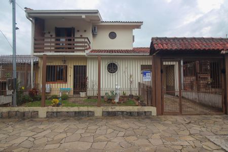 Casa à venda com 208m², 4 quartos e 2 vagas Casa à venda com 208m², 4 quartos e 2 vagasFachada