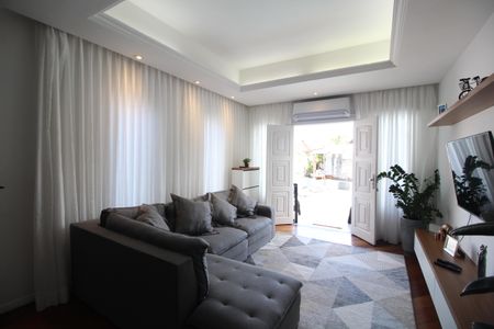 Casa de condomínio à venda com 300m², 4 quartos e 2 vagasSala