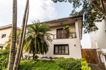 Casa de condomínio à venda com 341m², 4 quartos e 4 vagas Casa de condomínio à venda com 341m², 4 quartos e 4 vagasVista da Rua