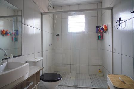 Casa à venda com 277m², 3 quartos e 2 vagasBanheiro suíte 