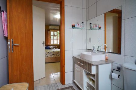 Casa à venda com 277m², 3 quartos e 2 vagasBanheiro suíte 