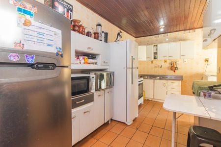 Casa à venda com 250m², 3 quartos e 1 vaga Casa à venda com 250m², 3 quartos e 1 vagaCozinha e Área de Serviço