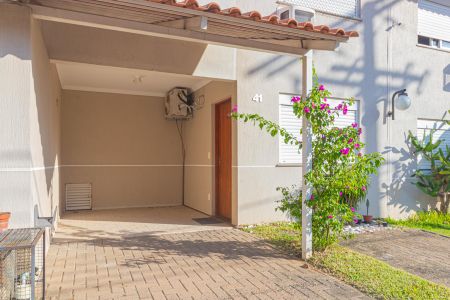 Casa de condomínio à venda com 122m², 3 quartos e 3 vagasFachada/Garagem