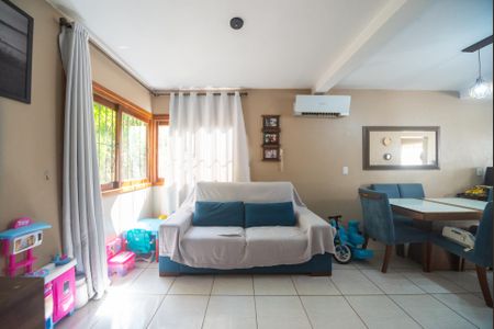 Sala de casa de condomínio para alugar com 2 quartos, 72m² em Santa Isabel, Viamão