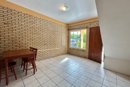 Sala  de casa de condomínio para alugar com 2 quartos, 81m² em Barra da Lagoa, Florianópolis