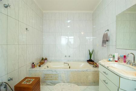 Casa à venda com 322m², 4 quartos e 4 vagas