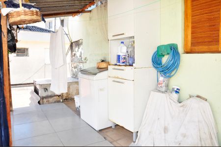 Casa à venda com 430m², 8 quartos e 4 vagasDetalhe - Casa 01 - Varanda com Área de Serviço 