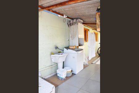 Casa à venda com 430m², 8 quartos e 4 vagasDetalhe - Casa 01 - Varanda com Área de Serviço 