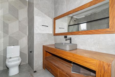 Casa de condomínio para alugar com 230m², 3 quartos e 4 vagasBanheiro 2 da Suíte