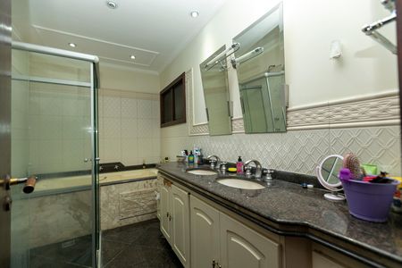 Casa de condomínio à venda com 415m², 4 quartos e 4 vagasBANHEIRO SUITE