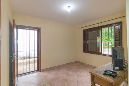 Sala de casa à venda com 4 quartos, 120m² em Harmonia, Canoas