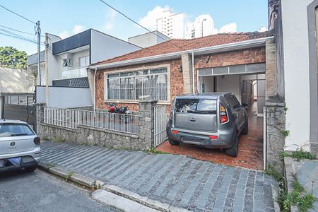 Casa à venda com 195m², 4 quartos e 2 vagas Casa à venda com 195m², 4 quartos e 2 vagasFachada