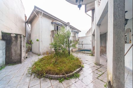 Casa à venda com 340m², 5 quartos e 7 vagasQuintal e Jardim