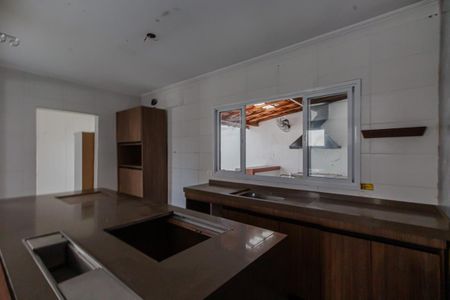 Casa de condomínio para alugar com 250m², 4 quartos e 3 vagasCozinha