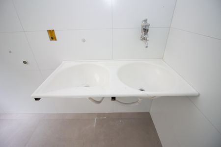 Casa à venda com 198m², 3 quartos e 2 vagas Casa à venda com 198m², 3 quartos e 2 vagasCozinha e Área de Serviço