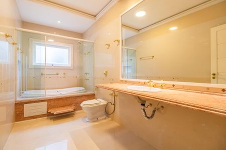 Casa de condomínio à venda com 450m², 4 quartos e 4 vagasBanheiro Quarto Americano