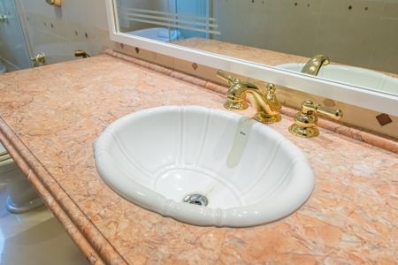 Casa de condomínio à venda com 450m², 4 quartos e 4 vagasBanheiro Quarto Americano
