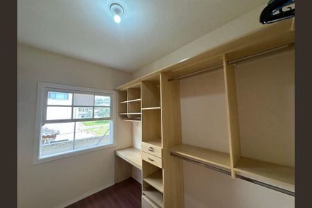 Casa de condomínio para alugar com 260m², 3 quartos e 4 vagasCloset da suíte 2