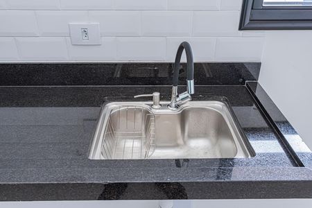 Sala, cozinha e área de serviço de apartamento à venda com 2 quartos, 38m² em Parque Sao Domingos, São Paulo