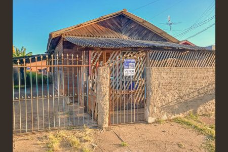 Fachada de casa à venda com 5 quartos, 130m² em Harmonia, Canoas