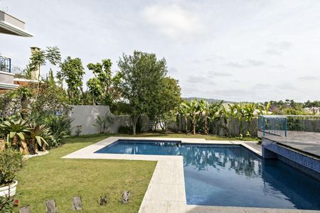 Casa de condomínio à venda com 900m², 5 quartos e 6 vagas Casa de condomínio à venda com 900m², 5 quartos e 6 vagasÁrea externa