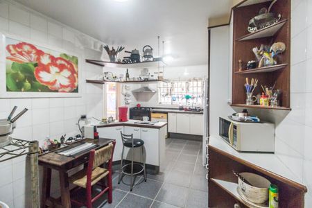 Casa de condomínio para alugar com 330m², 4 quartos e 5 vagasCozinha