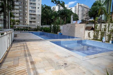 Apartamento à venda com 91m², 3 quartos e 2 vagas Apartamento à venda com 91m², 3 quartos e 2 vagasPiscina com churrasqueira e varanda em um condomínio residencial em São Paulo.