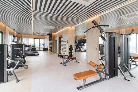 Studio à venda com 29m², 2 quartos e sem vagaGinásio com equipamentos de treino e iluminação adequada.