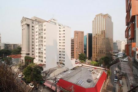 Studio à venda com 29m², 2 quartos e sem vagaEdifício residencial com vista para a cidade, com vários prédios ao redor.