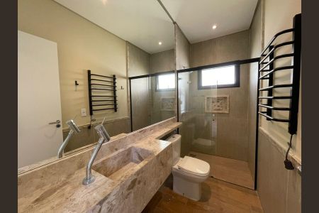 Casa de condomínio para alugar com 350m², 4 quartos e 4 vagasBanheiro 1