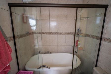 Casa à venda com 330m², 4 quartos e 2 vagasBanheiro Suíte 1