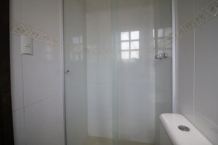 Casa de condomínio para alugar com 330m², 4 quartos e 1 vagaBanheiro da Suíte 2