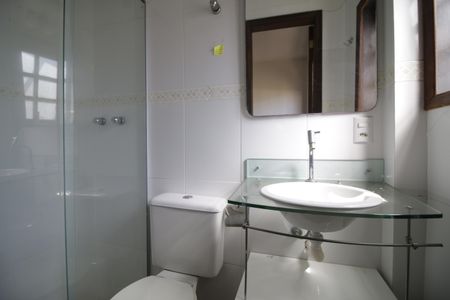 Casa de condomínio para alugar com 330m², 4 quartos e 1 vagaBanheiro da Suíte 2