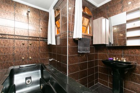 Casa para alugar com 200m², 3 quartos e 2 vagasBanheiro da Suíte 1 