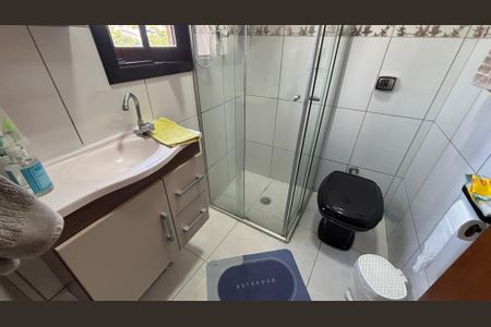 Casa à venda com 119m², 2 quartos e 2 vagasBanheiro da Suíte 2