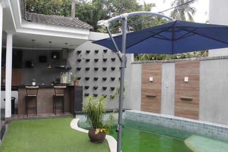 Casa de condomínio à venda com 400m², 4 quartos e 3 vagasÁrea externa