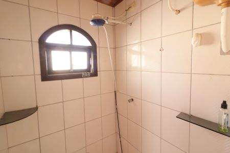 Casa à venda com 311m², 5 quartos e 2 vagasBanheiro 4