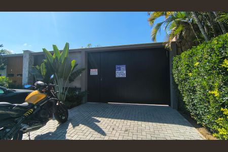 Casa de condomínio para alugar com 510m², 4 quartos e 2 vagasFachada da Casa