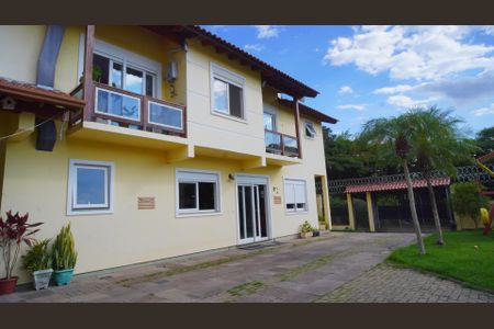 Fachada casa principal  de casa à venda com 4 quartos, 353m² em Morro Santana, Porto Alegre