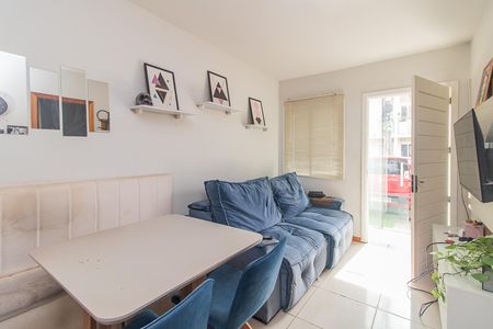 Sala de casa de condomínio à venda com 2 quartos, 43m² em Hípica, Porto Alegre