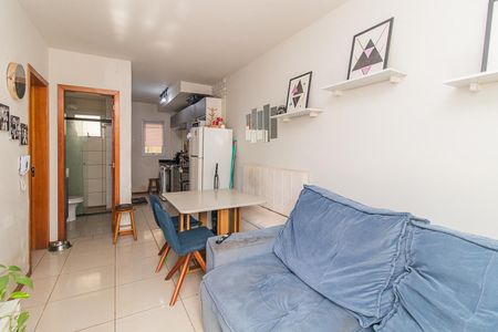 Sala de casa de condomínio à venda com 2 quartos, 43m² em Hípica, Porto Alegre