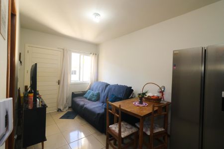 Sala de casa de condomínio à venda com 2 quartos, 49m² em Hípica, Porto Alegre